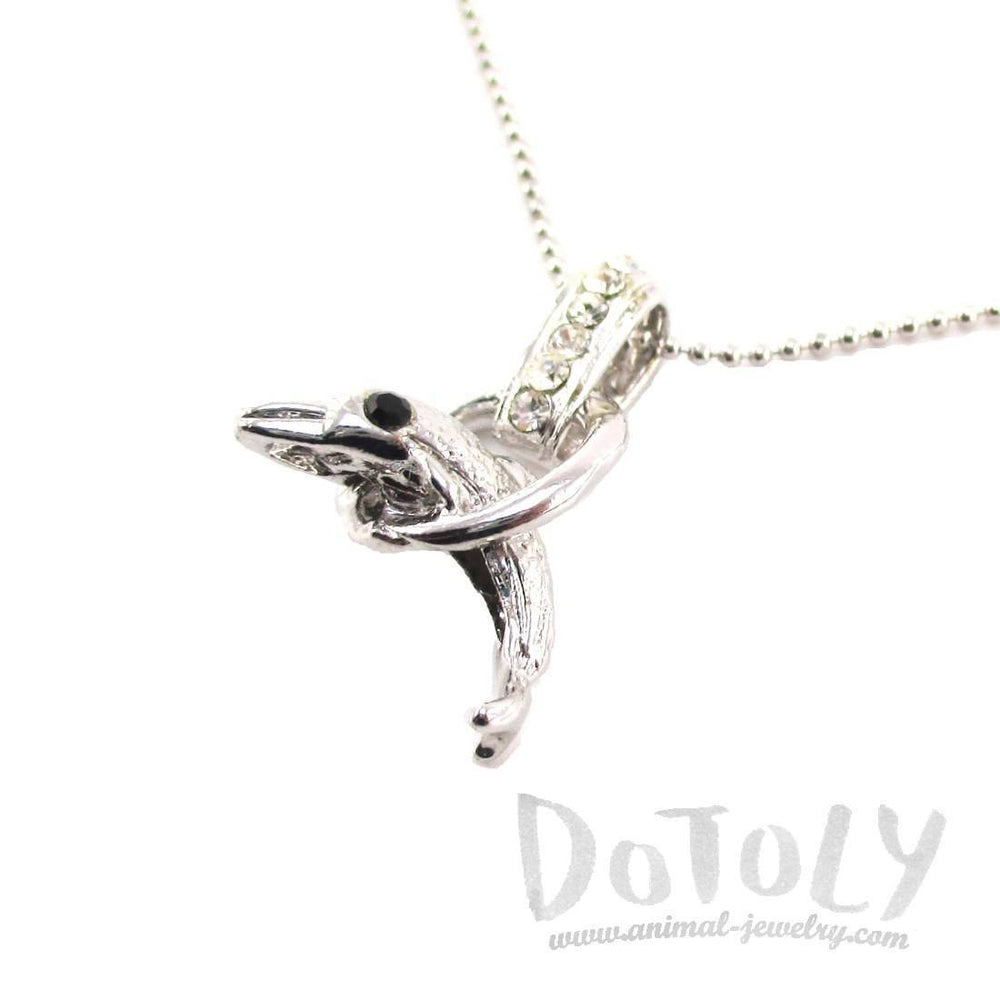 Baby Dolphin Jumping Through a Hoop Shaped Pendant Necklace in Silver