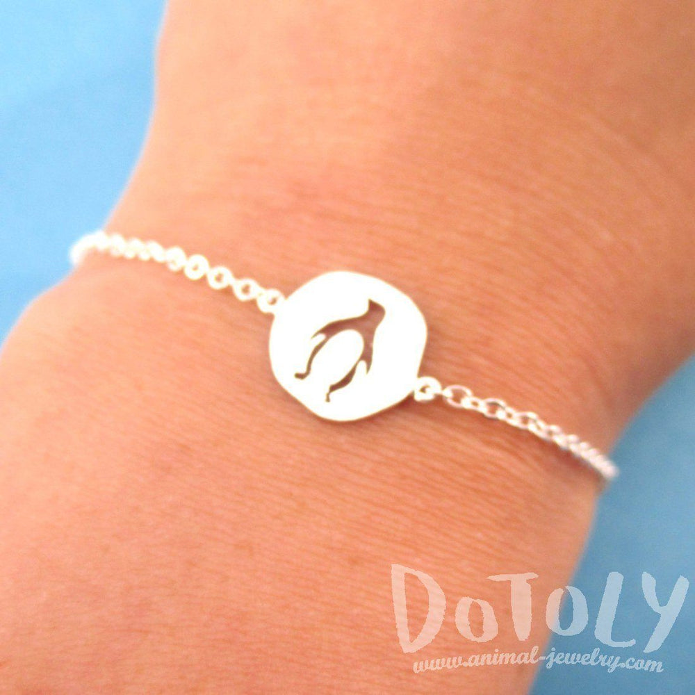 Charm Bracelet with Penguin Silhouette Cut Out in Silver | Animal Jewelry | DOTOLY