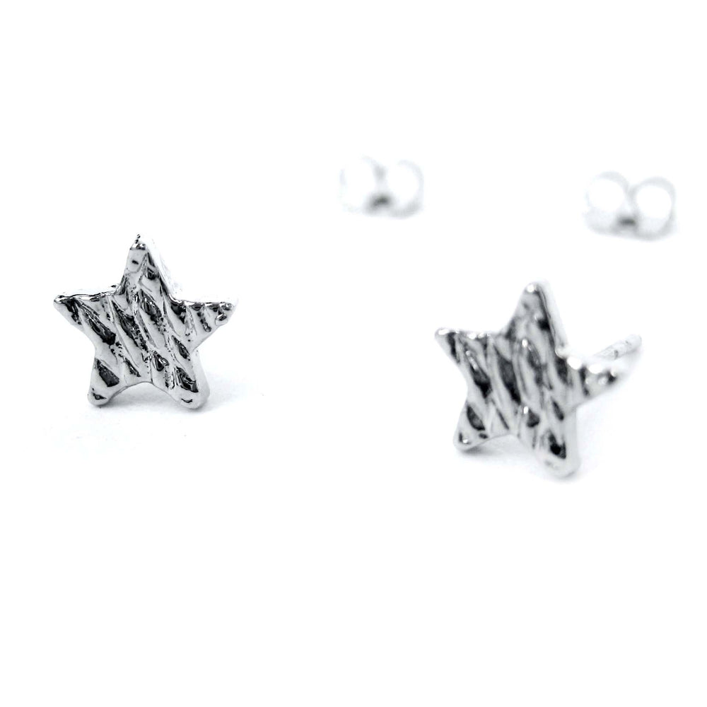 Small Star Shaped Stud Earrings with Textured Details in Silver | DOTOLY