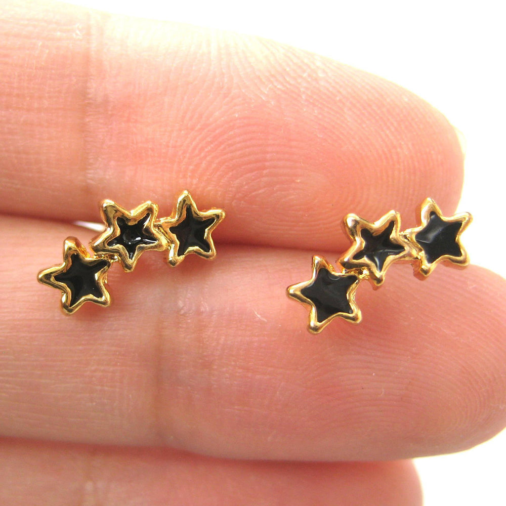 Small Connected Star Shaped Stud Earrings in Black on Gold | DOTOLY