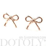 simple-bow-tie-ribbon-knot-shaped-stud-earrings-in-light-gold