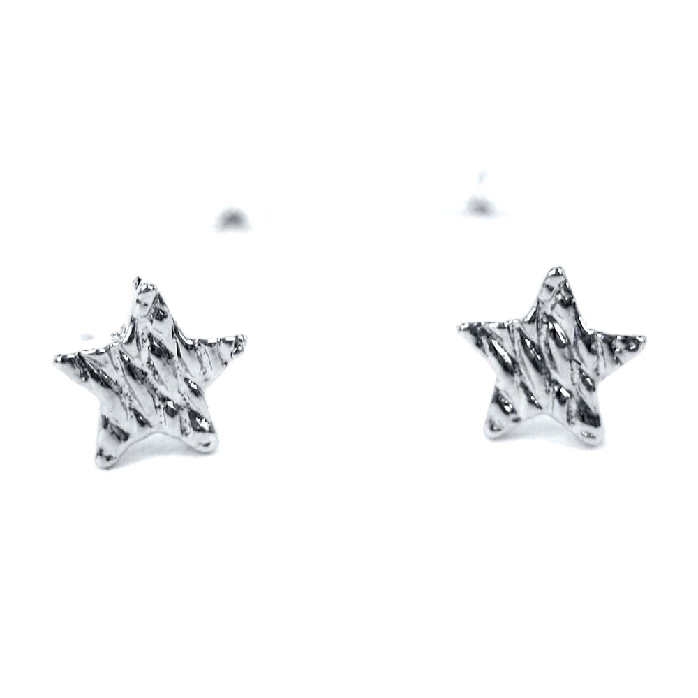 Small Star Shaped Stud Earrings with Textured Details in Silver | DOTOLY