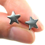Universe Night Sky: Star Shaped Stud Earrings in Gunmetal Silver | DOTOLY
