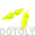 Fake Gauge Earrings: Rocker Chic Geometric Spike Faux Plug Stud Earrings in Neon Yellow | DOTOLY