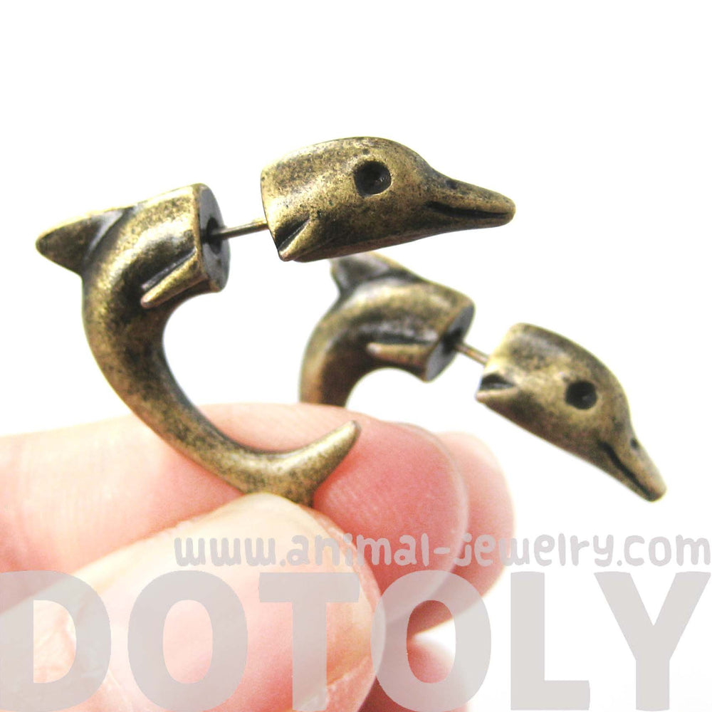 Fake Gauge Earrings: Small Dolphin Sea Animal Shaped Plug Stud Earrings in Brass | DOTOLY
