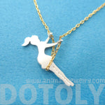 Girl Swinging on a Swing Acrobat Charm Necklace in Gold and Silver | DOTOLY | DOTOLY