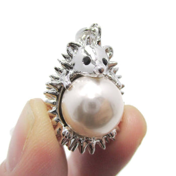 Hedgehog Porcupine Hugging a Pearl Shaped Animal Pendant Necklace in Silver | DOTOLY