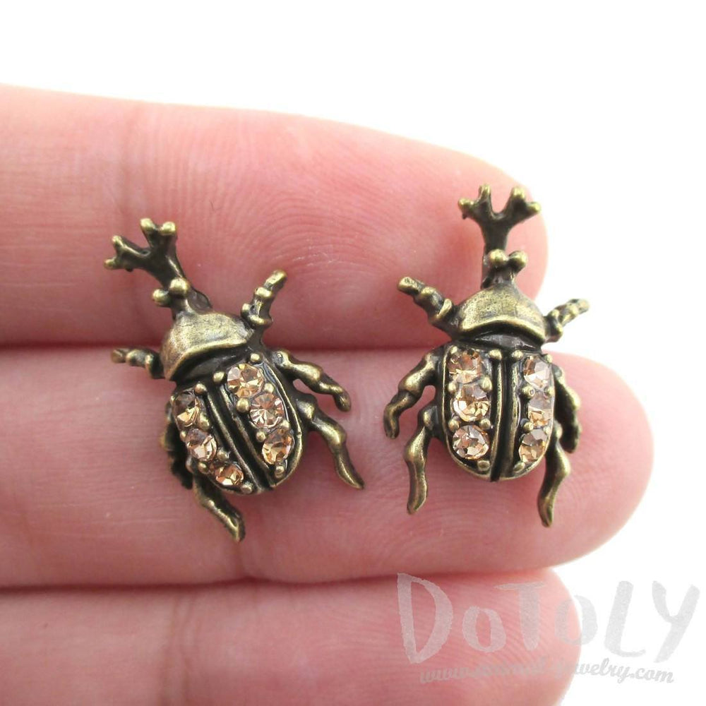 Hercules Rhino Beetle Shaped Rhinestone Stud Earrings in Brass | DOTOLY | DOTOLY