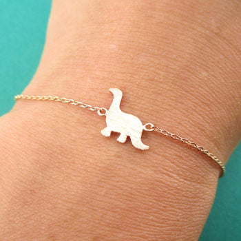 Long Neck Dinosaur Sauropoda Silhouette Shaped Charm Bracelet in Rose Gold | DOTOLY