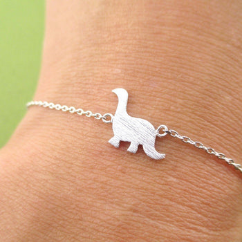 Long Neck Dinosaur Sauropoda Silhouette Shaped Charm Bracelet in Silver | DOTOLY