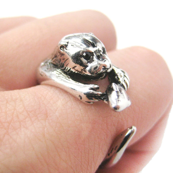 Otter Holding a Fish Shaped Animal Wrap Around Ring in Shiny Silver | US Sizes 4 to 9 | DOTOLY