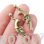 Realistic Gun Pistol Revolver Shaped Dangle Drop Stud Earrings in Brass | DOTOLY