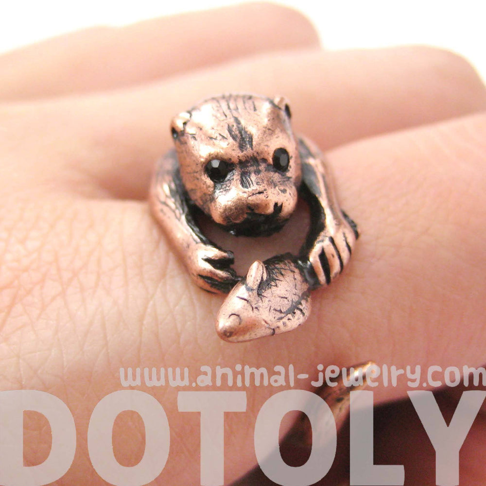 Realistic Otter Holding a Fish Shaped Animal Wrap Ring in Copper | US Sizes 4 to 9 | DOTOLY