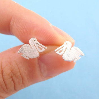 Small Pelican Silhouette with Fish Cut Out Shaped Stud Earrings in Silver | Allergy Free | DOTOLY