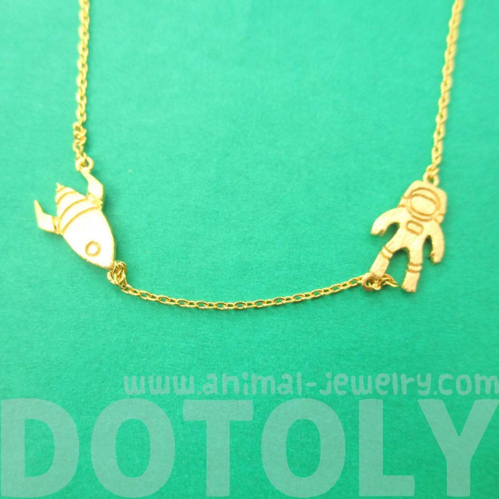 Spaceship and Astronaut Space Travel Themed Charm Necklace in Gold | DOTOLY | DOTOLY