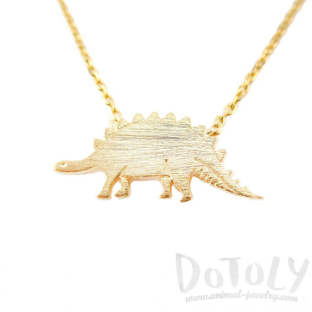 Stegosaurus Dinosaur Silhouette Jurassic World Themed Charm Necklace in Gold | DOTOLY