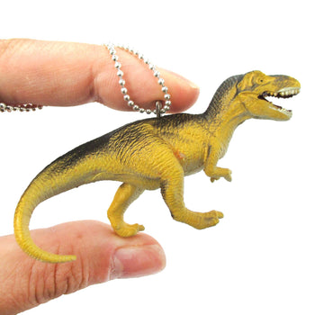 T-Rex Dinosaur Shaped Figurine Pendant Necklace in Yellow and Grey | Animal Jewelry | DOTOLY