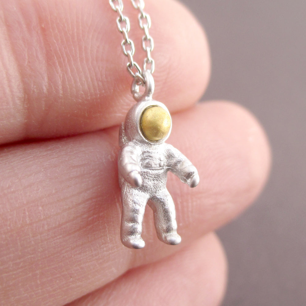 silver astronaut necklace