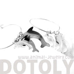 3D Dolphin Shaped Dangle Hoop Earrings in Silver | Animal Jewelry | DOTOLY