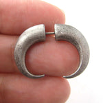 Fake Gauge Earrings: Rocker Chic Spike Hook Faux Plug Stud Earrings in Silver | DOTOLY