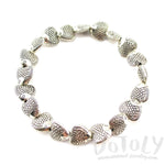 A Row Of Fish Shaped Beaded Stretchy Bracelet in Silver | DOTOLY | DOTOLY