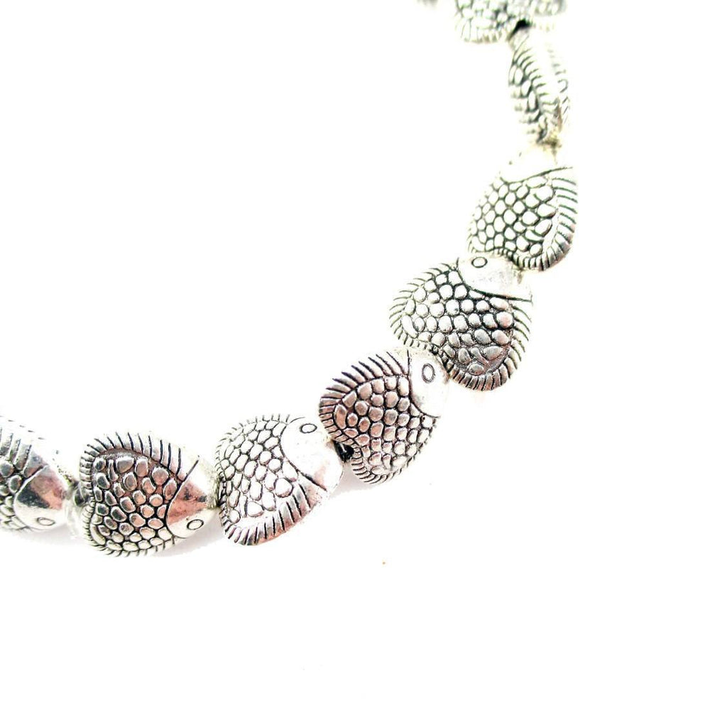 A Row Of Fish Shaped Beaded Stretchy Bracelet in Silver | DOTOLY | DOTOLY