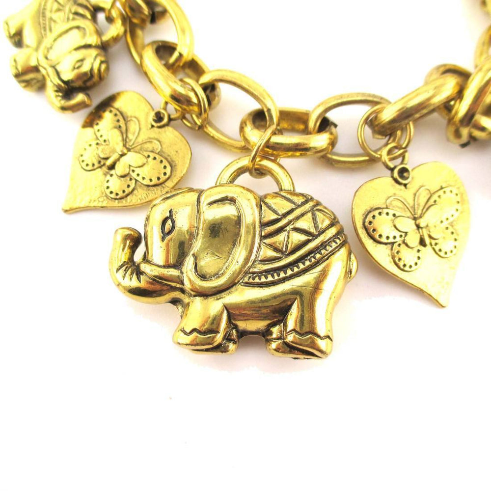 Abstract Elephant and Coins Shaped Charm Bracelet in Gold | Animal Jewelry | DOTOLY
