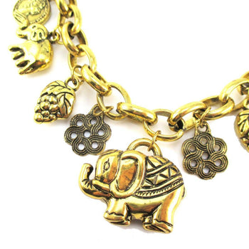 Abstract Elephant and Coins Shaped Charm Necklace in Gold | Animal Jewelry | DOTOLY