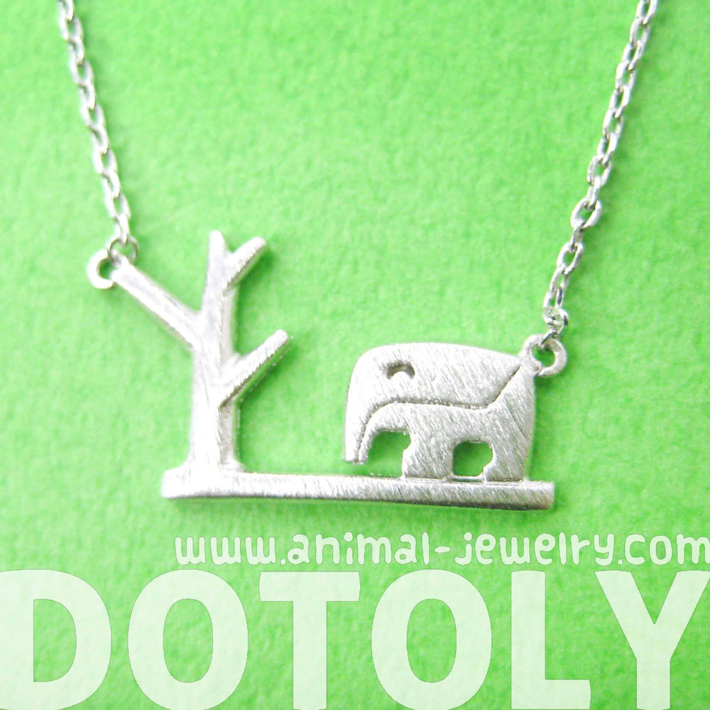 Abstract Elephant and Tree Silhouette Shaped Pendant Necklace in Silver | DOTOLY | DOTOLY