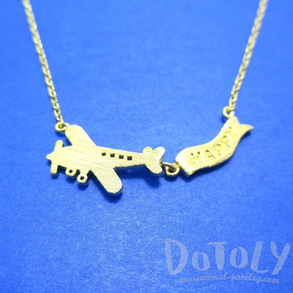 Airplane With Happy Banner Shaped Motivational Charm Necklace in Gold | DOTOLY | DOTOLY
