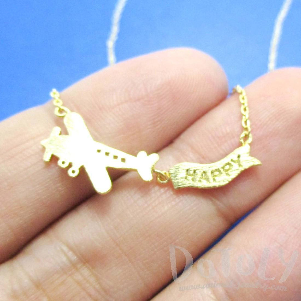 Airplane With Happy Banner Shaped Motivational Charm Necklace in Gold | DOTOLY | DOTOLY