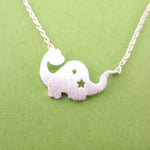 Apatosaurus Dinosaur with Star Cut Outs Shaped Charm Necklace in Silver | DOTOLY | DOTOLY