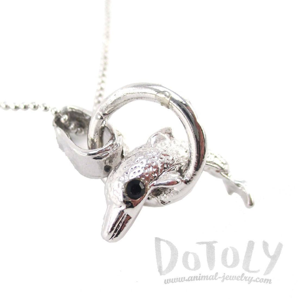 Baby Dolphin Jumping Through a Hoop Shaped Pendant Necklace in Silver