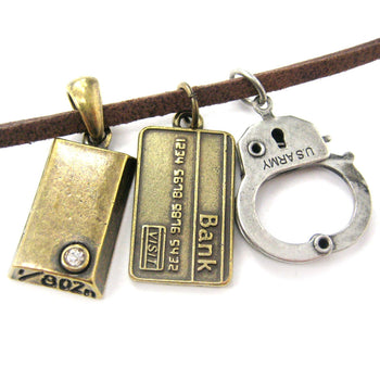 Bank Heist Themed Handcuff Gold Bar Bank Card Charm Necklace | DOTOLY | DOTOLY