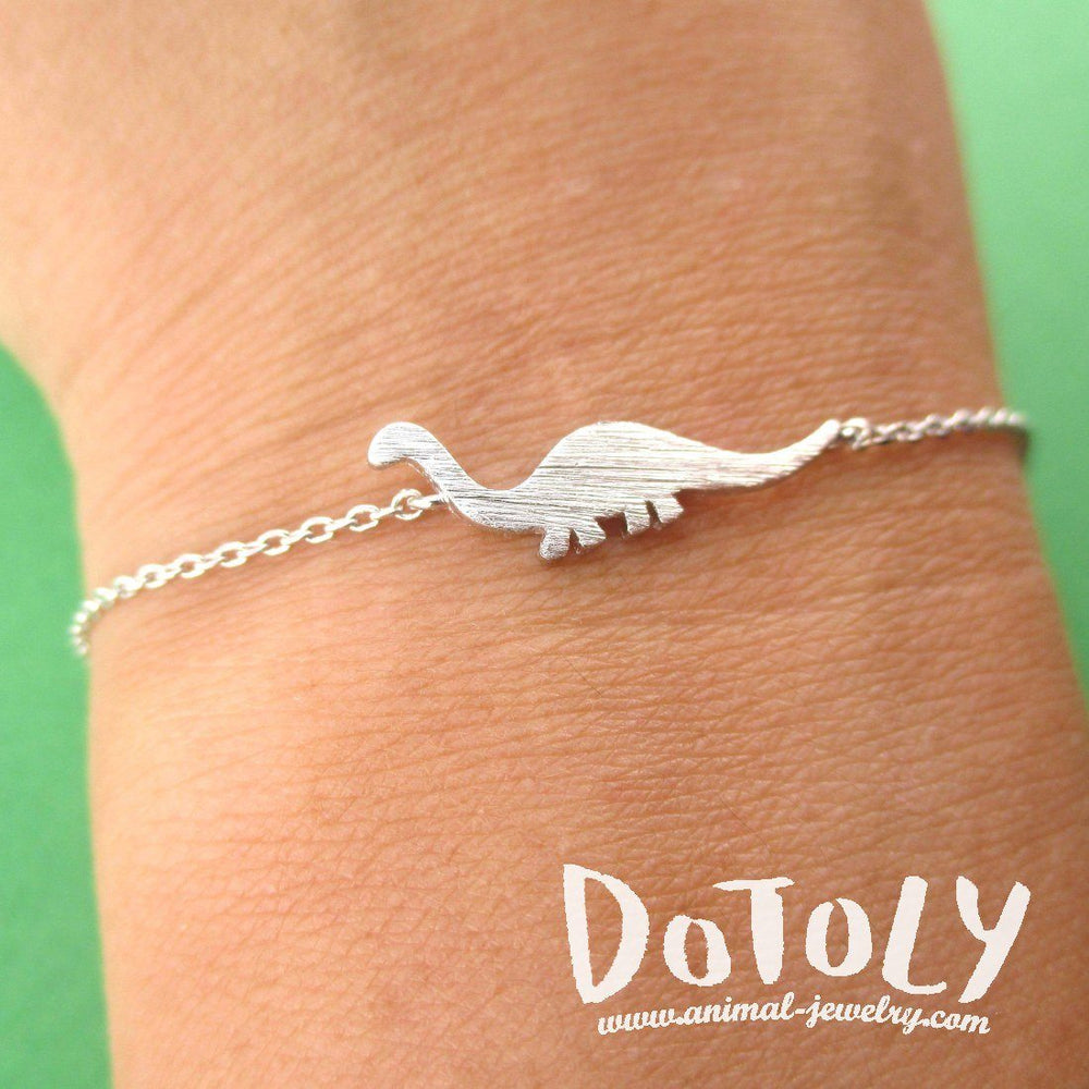 Brontosaurus Dinosaur Silhouette Prehistoric Themed Charm Bracelet in Silver | DOTOLY