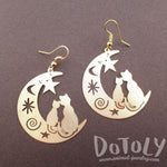 Cats on a Crescent Moon Cut Out Silhouette Shaped Dangle Earrings in Gold | Animal Jewelry | DOTOLY