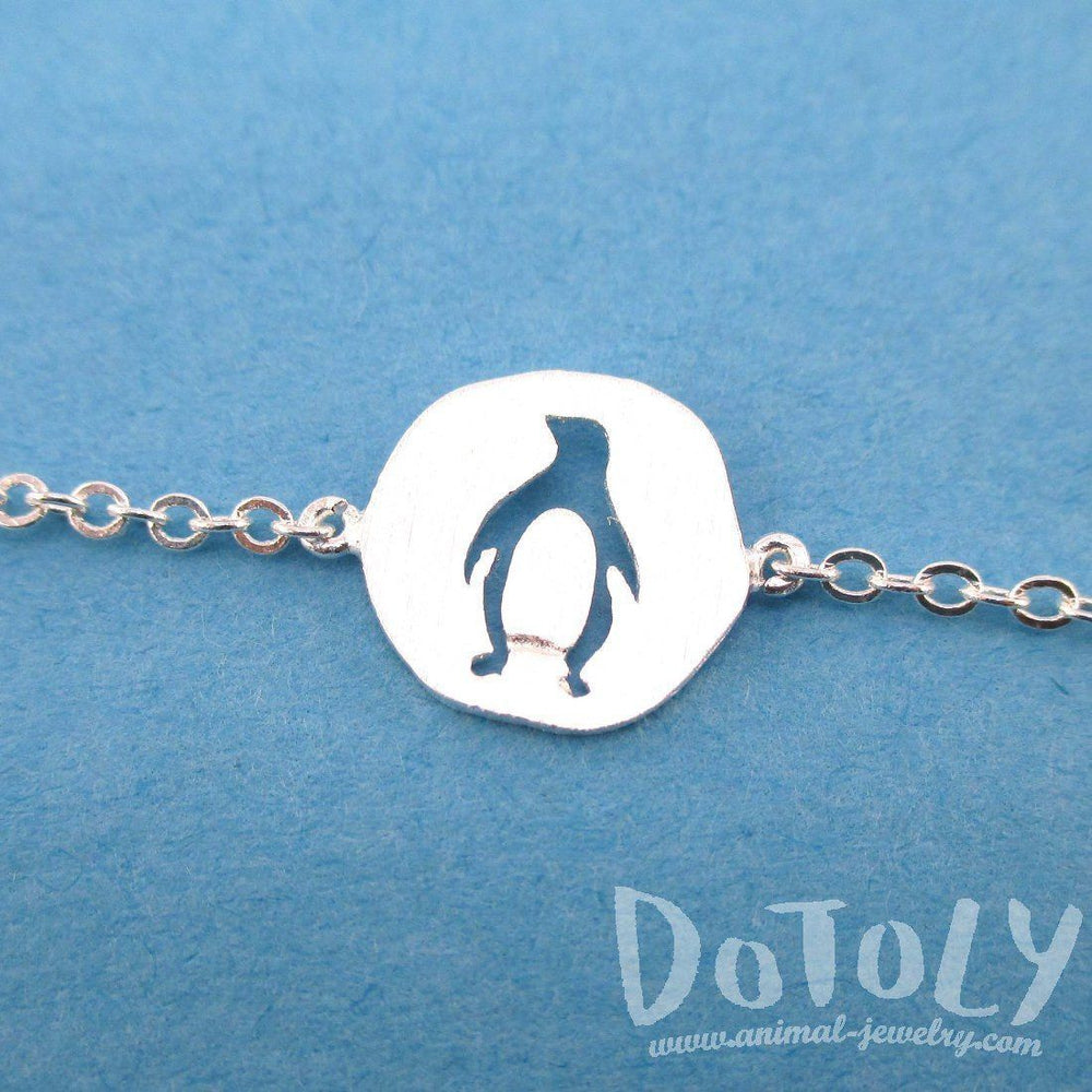 Charm Bracelet with Penguin Silhouette Cut Out in Silver | Animal Jewelry | DOTOLY