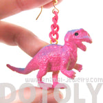 Classic Dinosaur Animal Figurine Shaped Dangle Earrings in Pink | DOTOLY
