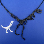Dinosaur Themed T-Rex Fossil Ring and Skeleton Necklace 2 Piece Set