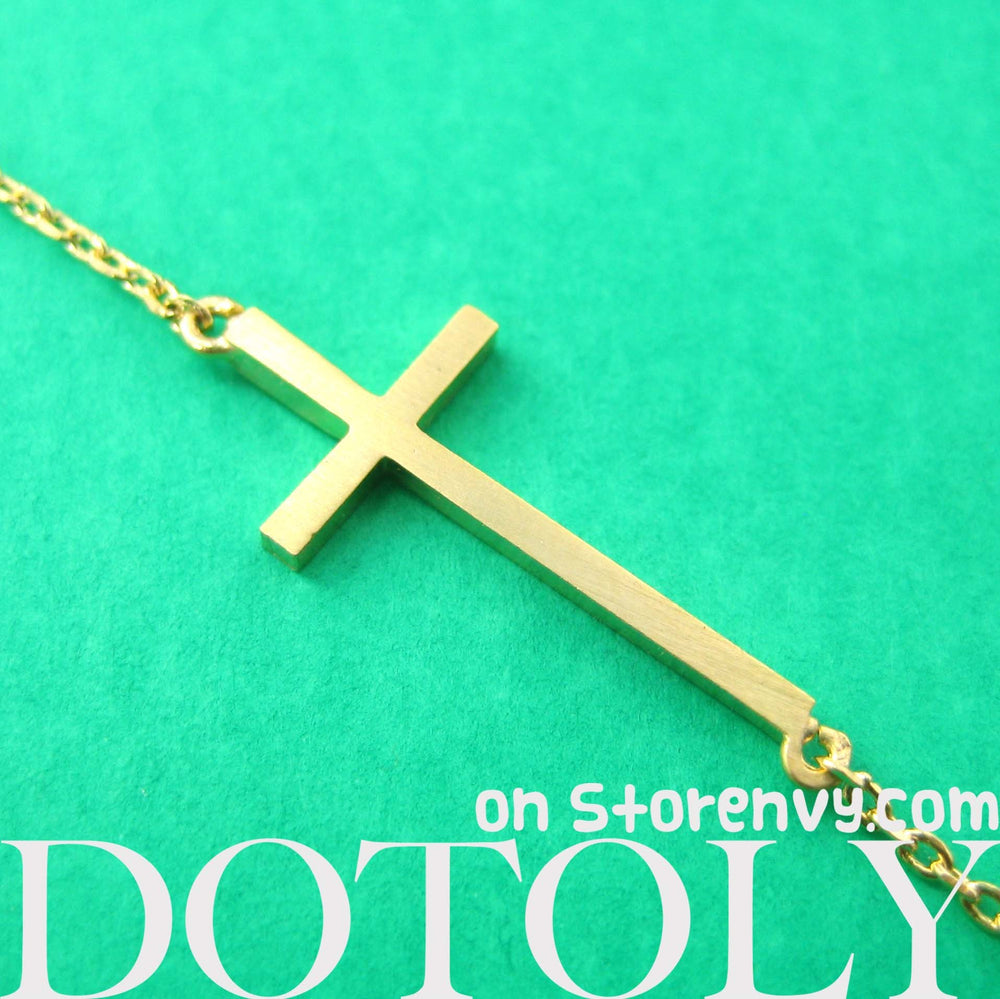 simple-cross-shaped-bar-bracelet-in-gold