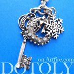 Antique Skeleton Key and Snowflake Pendant Necklace in Silver | DOTOLY