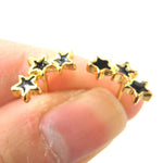Small Connected Star Shaped Stud Earrings in Black on Gold | DOTOLY