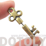 fake-gauge-earrings-antique-key-shaped-faux-plug-stud-earrings-in-brass