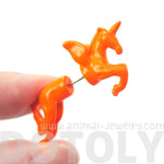 Fake Gauge Earrings: Mythical Unicorn Horse Animal Faux Plug Stud Earrings in Orange | DOTOLY