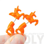 Fake Gauge Earrings: Mythical Unicorn Horse Animal Faux Plug Stud Earrings in Orange | DOTOLY