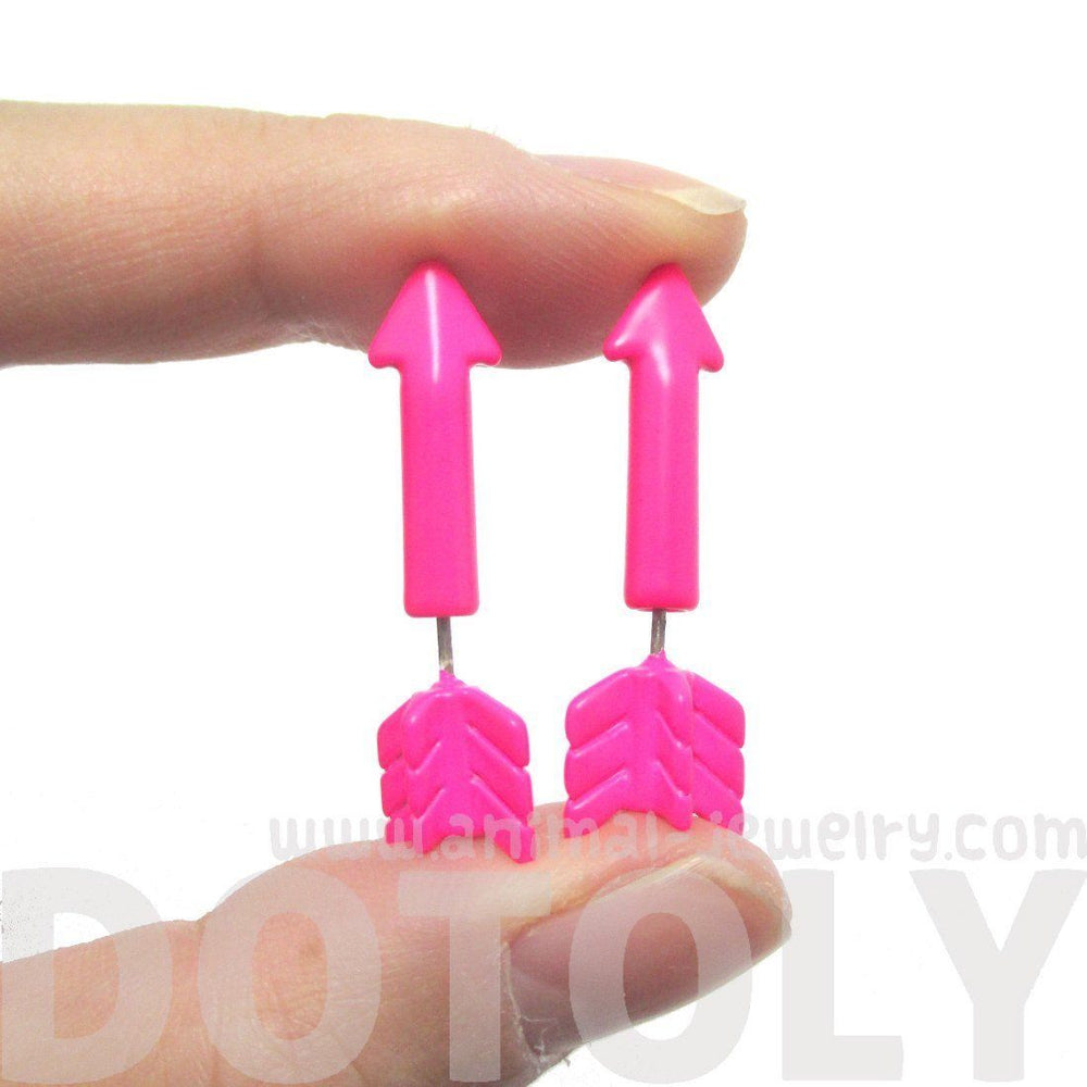 Fake Gauge Earrings: Realistic Arrow Shaped Faux Plug Stud Earrings in Pink | DOTOLY