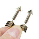 Fake Gauge Earrings: Realistic Arrow Shaped Faux Plug Stud Earrings in Shiny Gold | DOTOLY