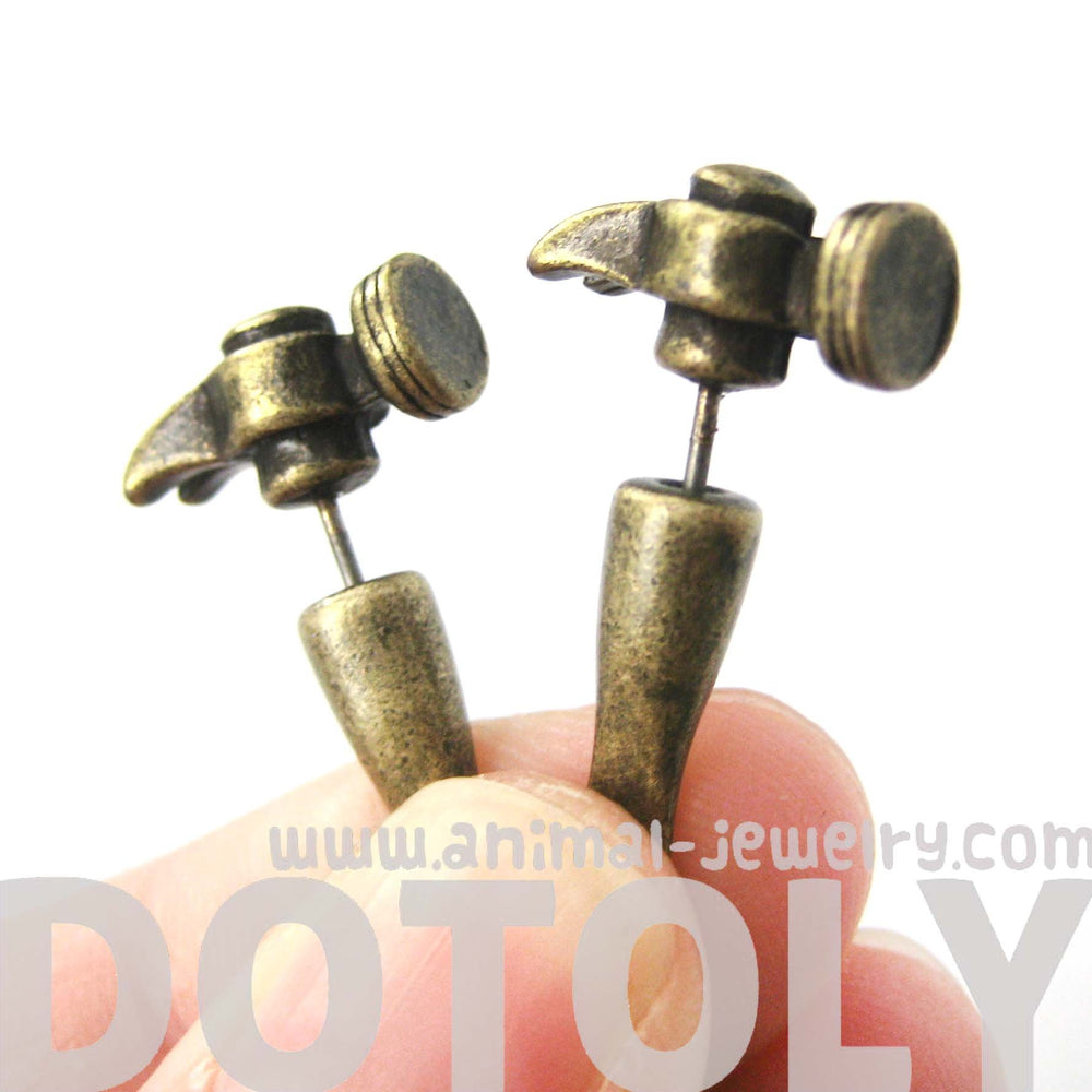 Fake Gauge Earrings: Realistic Hammer Shaped Faux Plug Stud Earrings in Bronze | DOTOLY