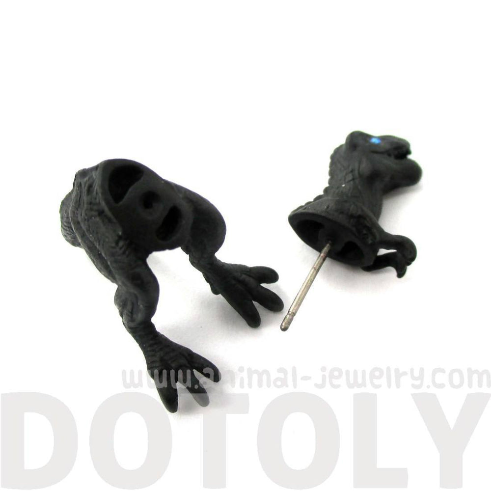 Fake Gauge Earrings: Realistic Tyrannosaurus T-Rex Shaped Front and Back Stud Earrings in Black | DOTOLY