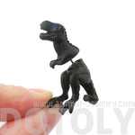 Fake Gauge Earrings: Realistic Tyrannosaurus T-Rex Shaped Front and Back Stud Earrings in Black | DOTOLY